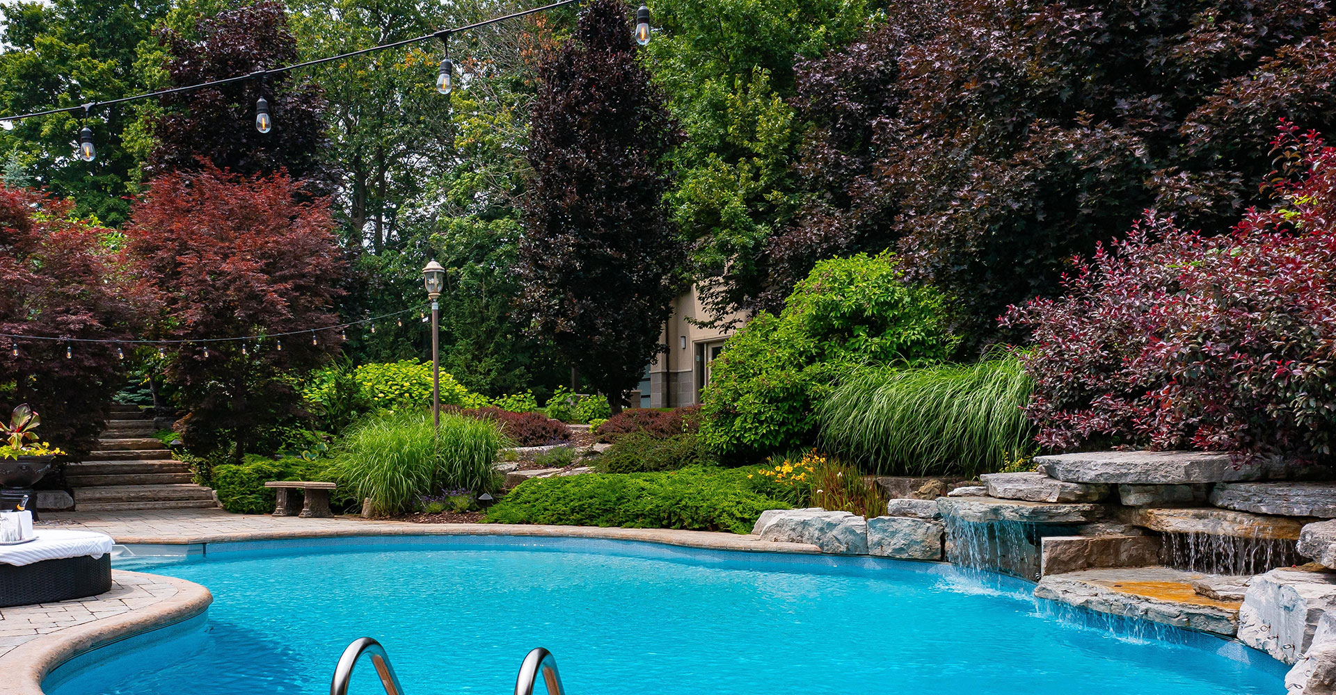 beautiful landscape design with hardscapes and outdoor lighting